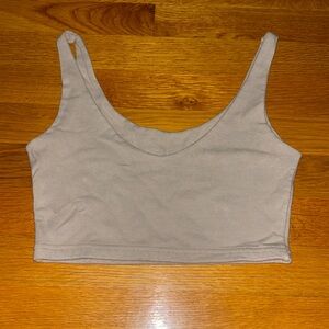 a cream/beige crop top